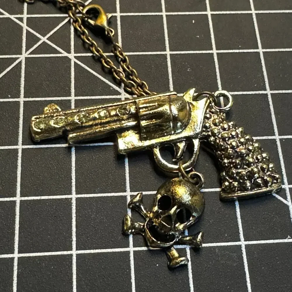 Antique gold tone rhinestone embellished pistol pendant necklace wester cowgirl
